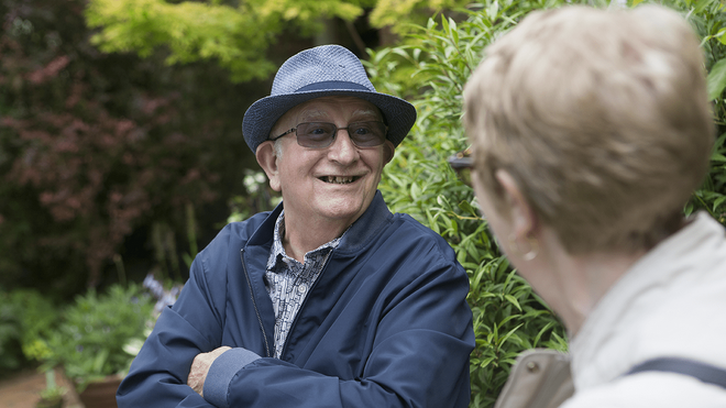 man chatting to woman