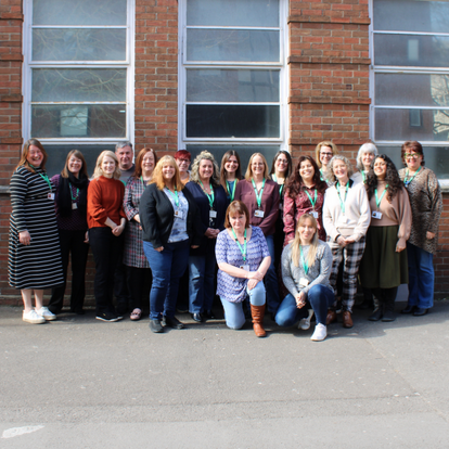 two women walking along street