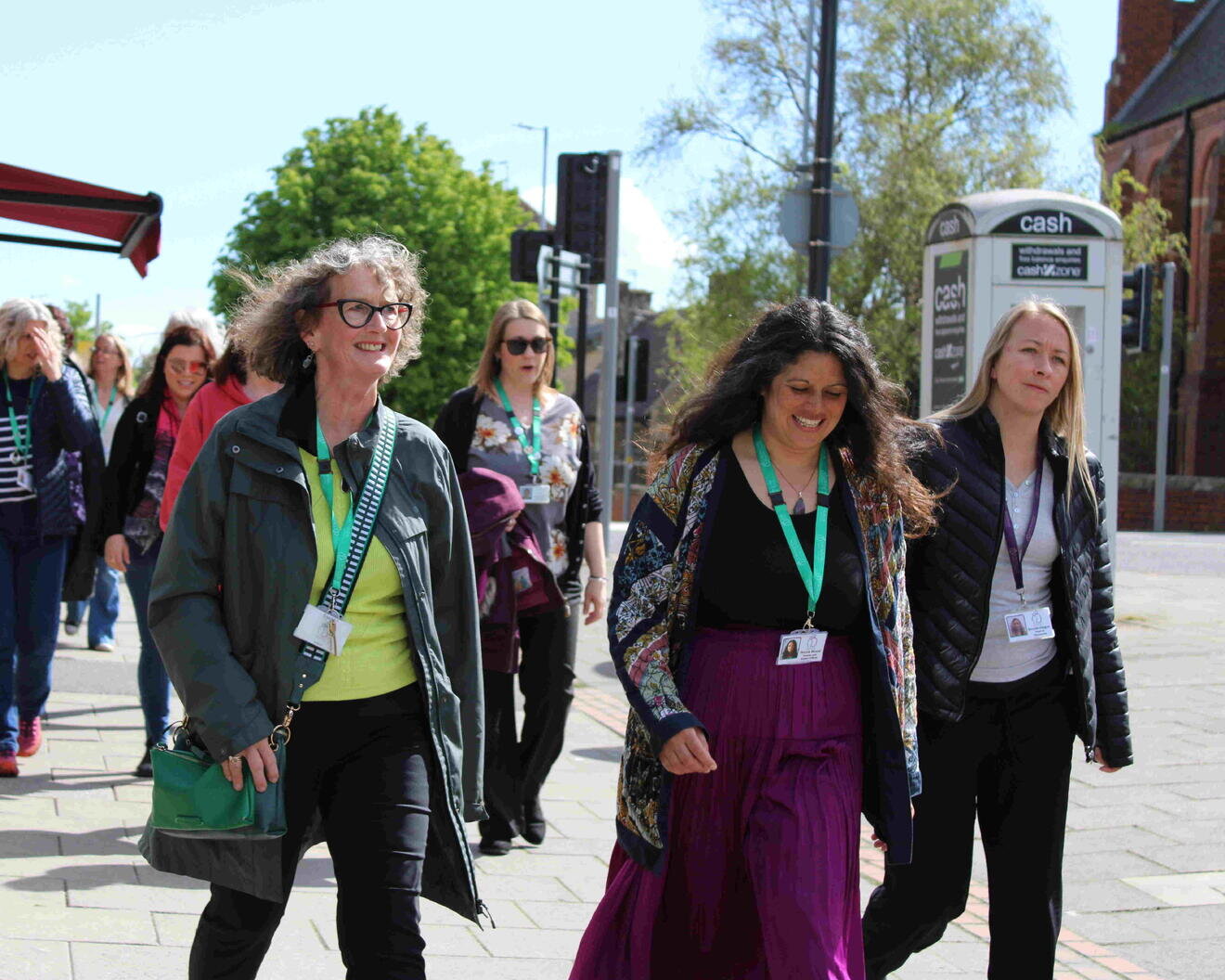 women walking along street